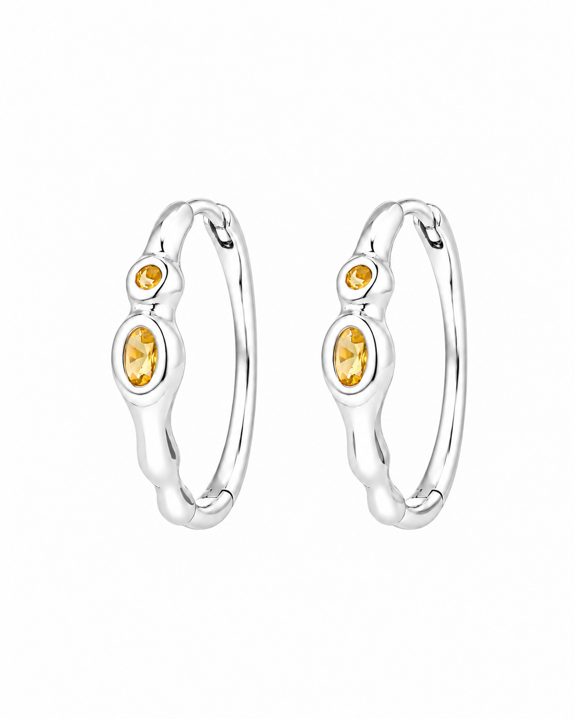Bebe Silver Earrings - sculptural silver hoops with yellow-orange glass gemstones