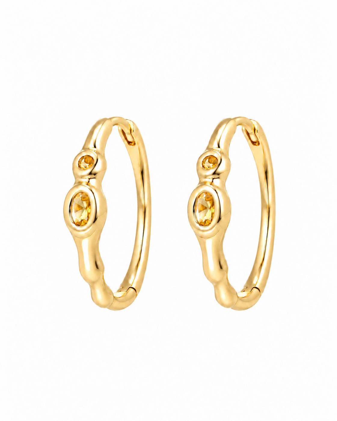 Bebe Gold Earrings - sculptural gold hoops with yellow-orange glass gemstones