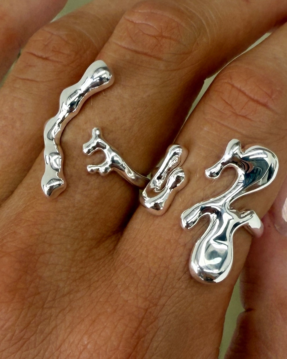 Close-up of the Vespera sterling silver sculptural ring